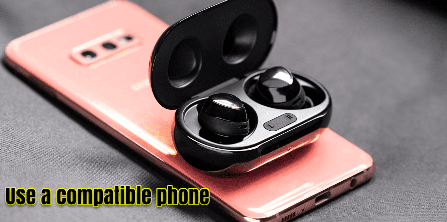 Use a compatible phone to charge your Galaxy Buds
